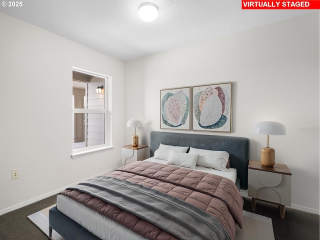 15325 NW Central Dr Unit 301, Portland, OR 97229 - bedroom featuring carpet floors and a textured ceiling