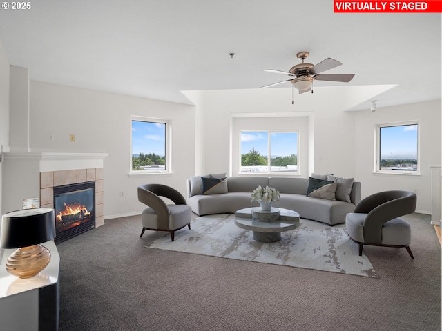 15325 NW Central Dr Unit 301, Portland, OR 97229 - carpeted living area with a ceiling fan and a tile fireplace