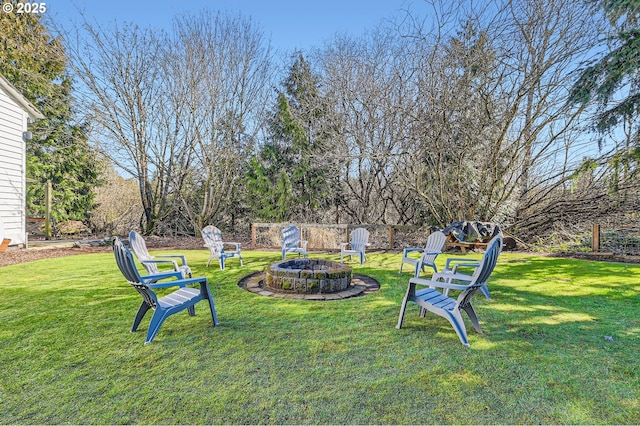 view of yard featuring a fire pit