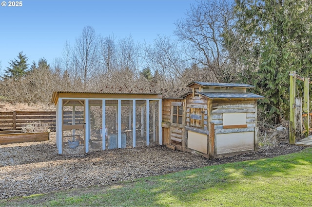 view of poultry coop with fence