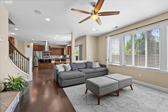 21615 SW Derby Ter, Sherwood, OR 97140 - living area with a ceiling fan, stairs, dark wood-style floors, baseboards, and recessed lighting