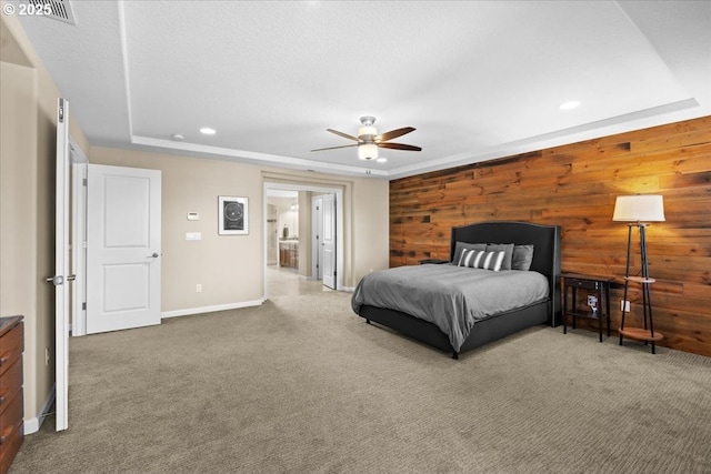 21615 SW Derby Ter, Sherwood, OR 97140 - carpeted bedroom with wood walls, recessed lighting, baseboards, a ceiling fan, and a tray ceiling