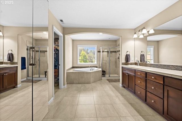 21615 SW Derby Ter, Sherwood, OR 97140 - bathroom featuring vanity, healthy amount of natural light, and a stall shower