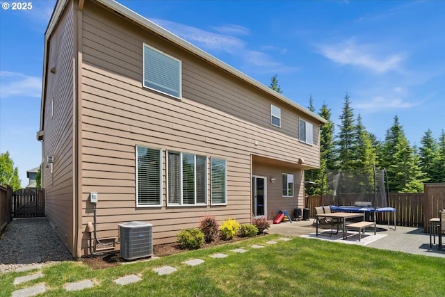21615 SW Derby Ter, Sherwood, OR 97140 - back of house featuring cooling unit and a patio area