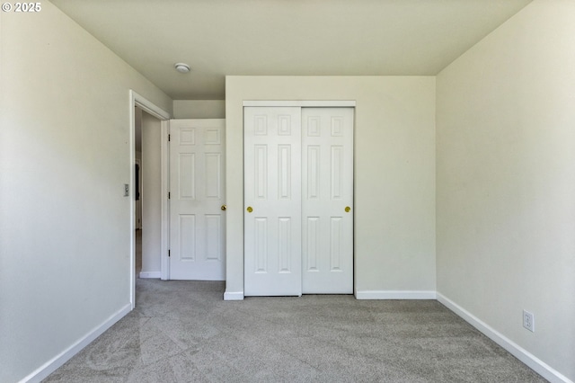 1222 Laurel Ct, Sweet Home, OR 97386 - unfurnished bedroom with carpet, baseboards, and a closet