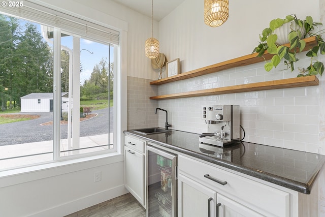 39313 NE 143rd Pl, Amboy, WA 98601 - kitchen with open shelves, a sink, a wealth of natural light, and wine cooler