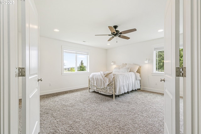 39313 NE 143rd Pl, Amboy, WA 98601 - carpeted bedroom with baseboards, a ceiling fan, recessed lighting, and multiple windows