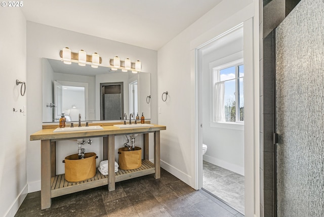 39313 NE 143rd Pl, Amboy, WA 98601 - full bath with a sink, baseboards, and toilet