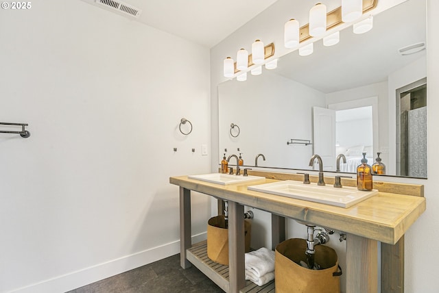 39313 NE 143rd Pl, Amboy, WA 98601 - full bath with visible vents, double sink, and baseboards