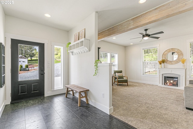 39313 NE 143rd Pl, Amboy, WA 98601 - entrance foyer with a glass covered fireplace, baseboards, recessed lighting, and beam ceiling