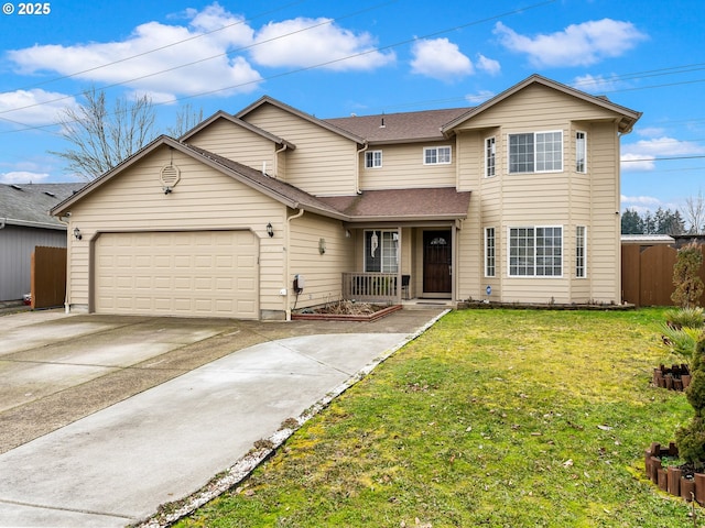 view of property featuring a garage and a front lawn