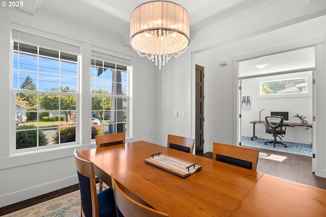 2608 N Winchell St, Portland, OR 97217 - dining area with wood finished floors, baseboards, an office area, ornamental molding, and a chandelier