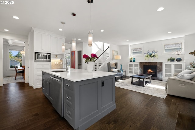 2608 N Winchell St, Portland, OR 97217 - kitchen featuring a sink, stainless steel appliances, gray cabinets, white cabinets, and open floor plan