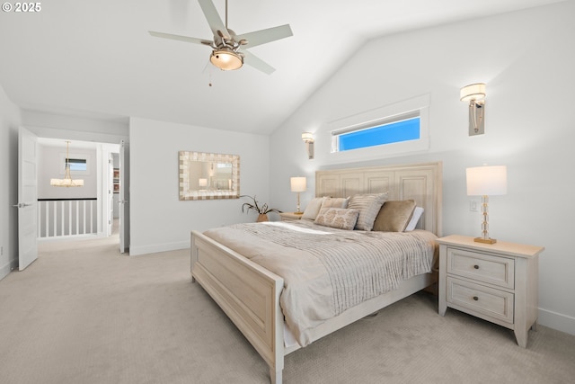 2608 N Winchell St, Portland, OR 97217 - bedroom with baseboards, light colored carpet, a chandelier, a ceiling fan, and high vaulted ceiling