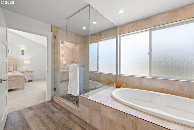 2608 N Winchell St, Portland, OR 97217 - full bathroom featuring a garden tub, a stall shower, recessed lighting, and wood finished floors