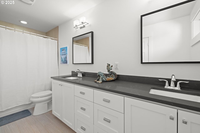 2608 N Winchell St, Portland, OR 97217 - bathroom featuring toilet, double vanity, and a shower with shower curtain