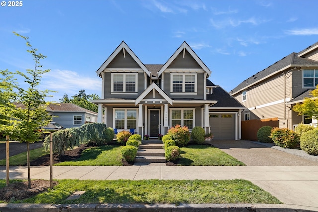 2608 N Winchell St, Portland, OR 97217 - craftsman-style house with driveway, a garage, and covered porch