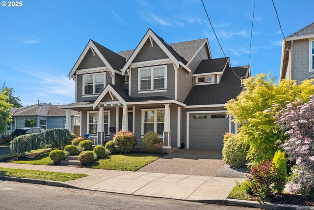 2608 N Winchell St, Portland, OR 97217 - view of front facade with a porch, a shingled roof, and asphalt driveway