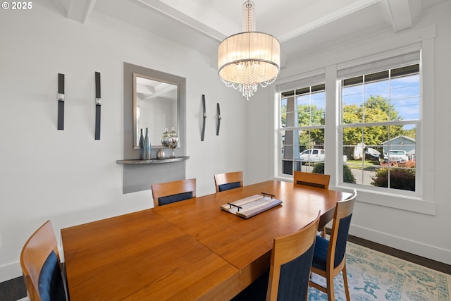 2608 N Winchell St, Portland, OR 97217 - dining space featuring beam ceiling, crown molding, a chandelier, wood finished floors, and baseboards