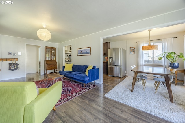 living area with dark wood-type flooring