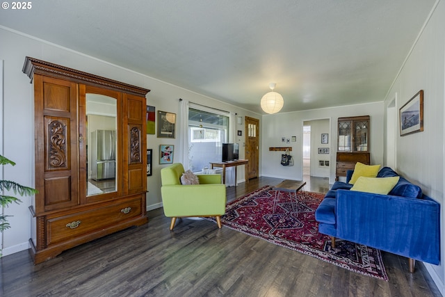 living room featuring dark wood-style floors and baseboards