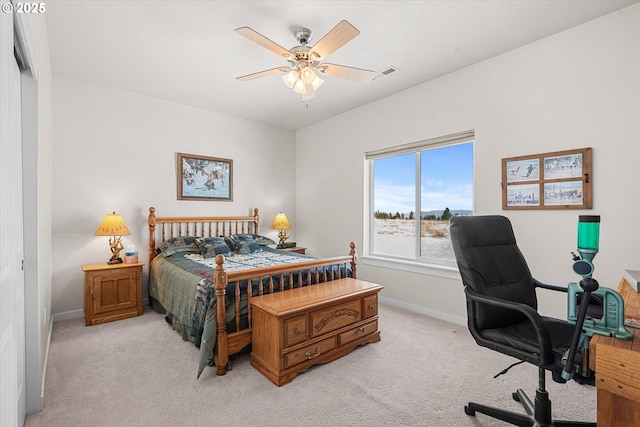 carpeted bedroom with ceiling fan