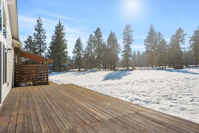 view of snow covered deck