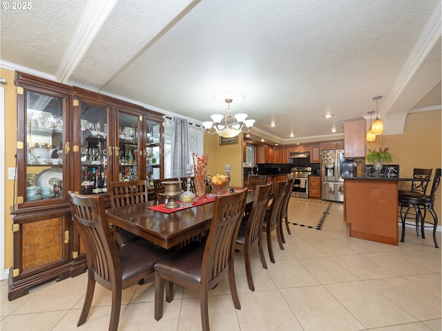 dining room featuring light tile patterned flooring, crown molding, a chandelier, and a textured ceiling