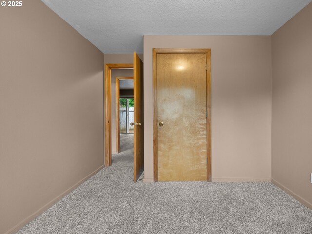 17555 Koch Ct, Sandy, OR 97055 - carpeted spare room featuring baseboards and a textured ceiling