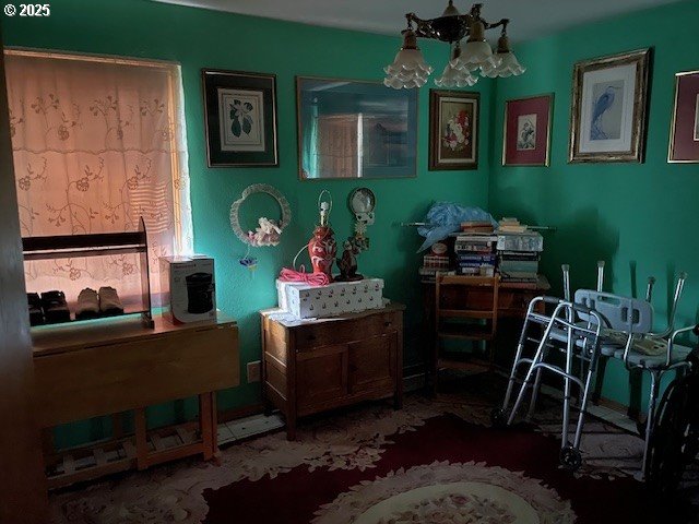 misc room featuring a chandelier