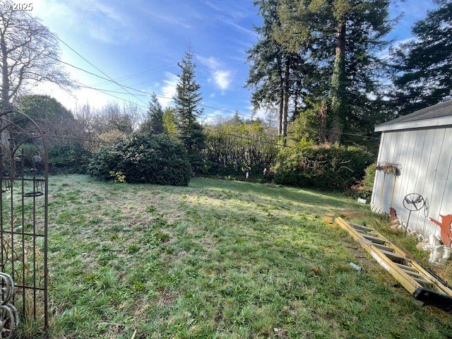 view of yard featuring fence