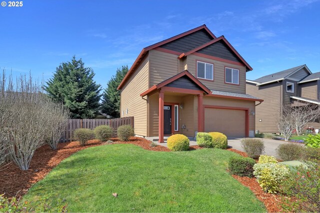 craftsman inspired home with fence, a garage, and concrete driveway