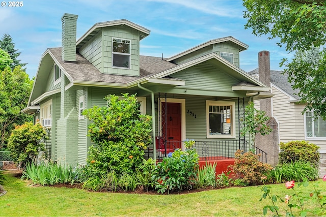 2951 NE 35th Ave, Portland, OR 97212 - view of front facade featuring a chimney, covered porch, roof with shingles, and a front yard