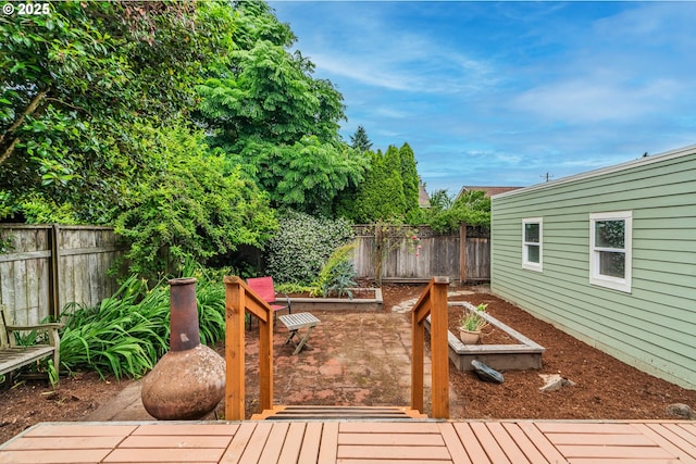 2951 NE 35th Ave, Portland, OR 97212 - wooden deck with a fenced backyard and a garden