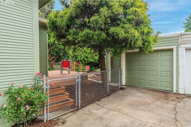 2951 NE 35th Ave, Portland, OR 97212 - garage with concrete driveway and a gate