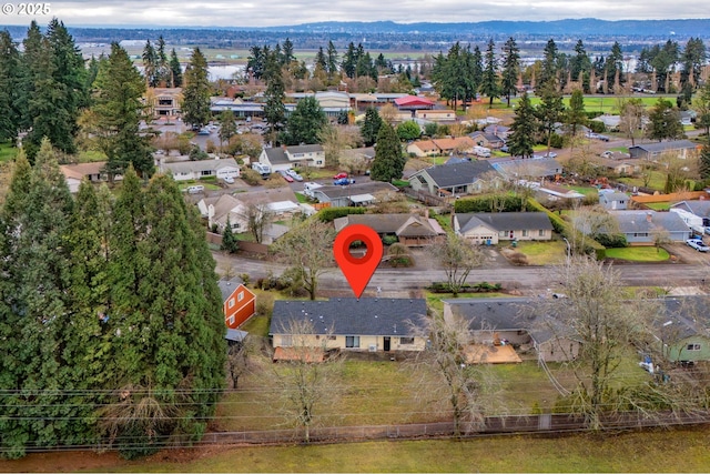 bird's eye view with a residential view and a mountain view