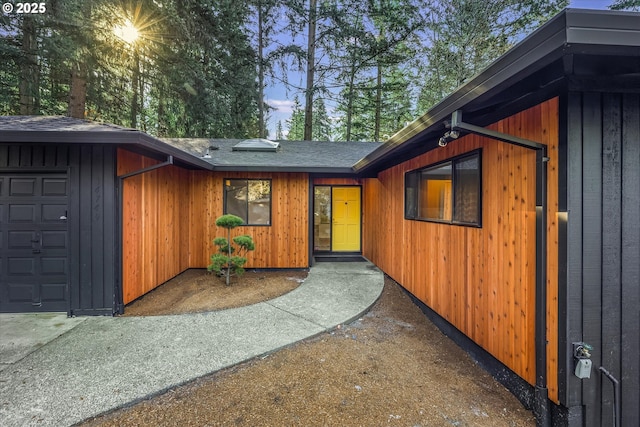 property entrance with a garage