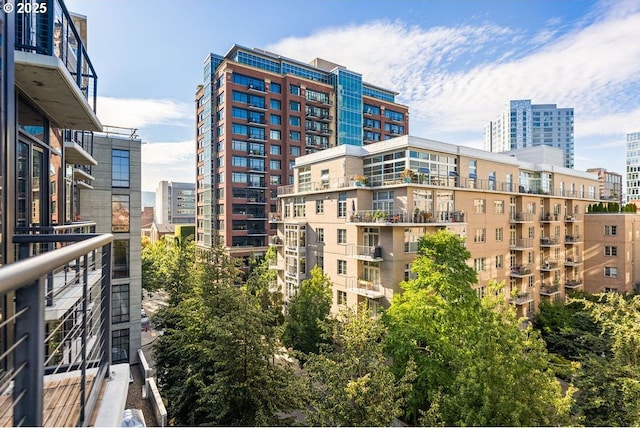 view of building exterior featuring a view of city