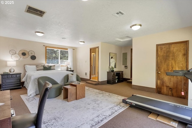 carpeted bedroom with electric panel, a textured ceiling, baseboards, and visible vents