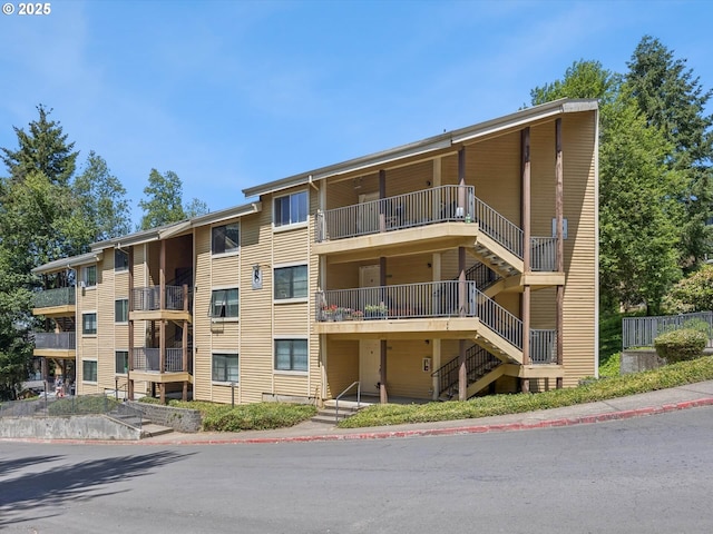 9908 SE Talbert St, Clackamas, OR 97015 - view of apartment building / complex featuring stairs