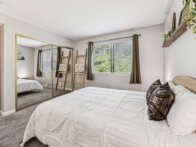 9908 SE Talbert St, Clackamas, OR 97015 - bedroom with carpet, a baseboard radiator, and a closet