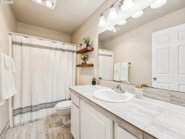 9908 SE Talbert St, Clackamas, OR 97015 - bathroom featuring vanity, wood finished floors, and a shower with curtain
