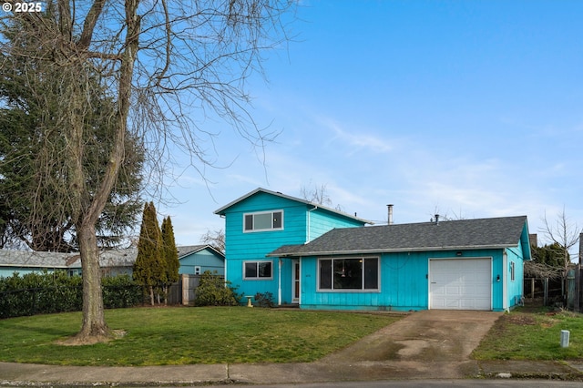 front facade featuring a garage and a front yard