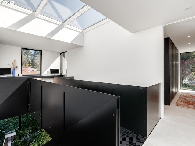kitchen with a skylight and healthy amount of natural light