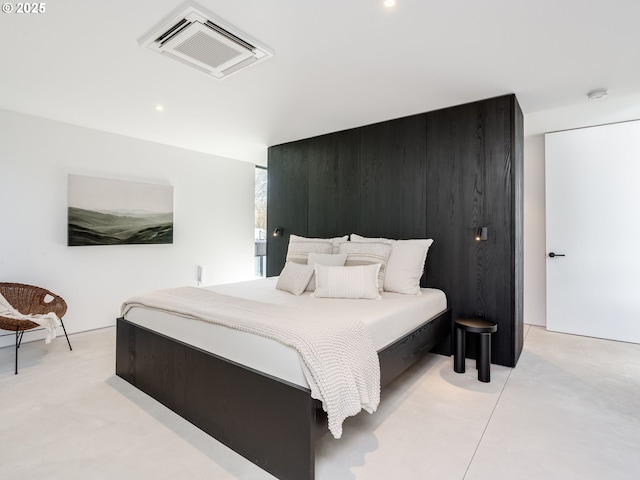 bedroom featuring recessed lighting
