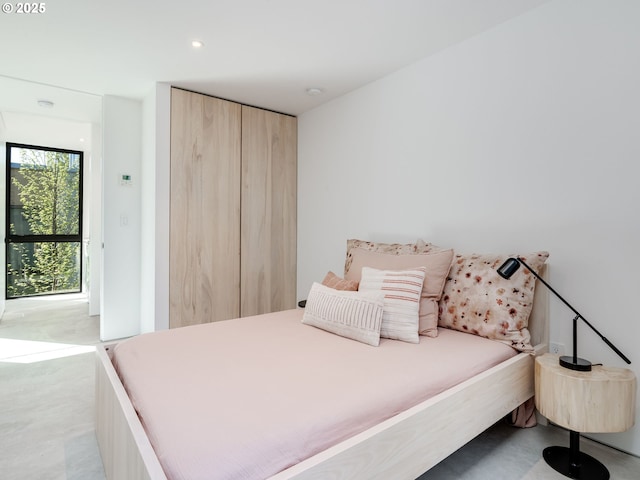bedroom with recessed lighting