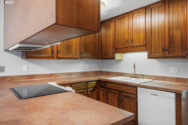 kitchen featuring dishwasher, a sink, stovetop, brown cabinets, and light countertops