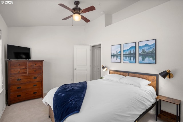 bedroom featuring ceiling fan, light colored carpet, and lofted ceiling
