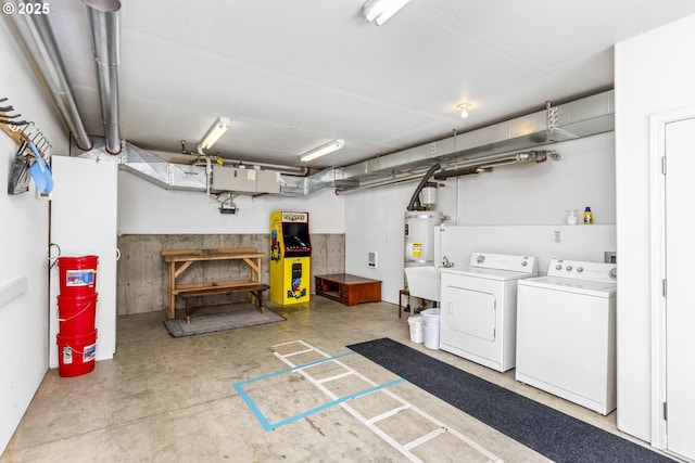 finished below grade area featuring independent washer and dryer and strapped water heater
