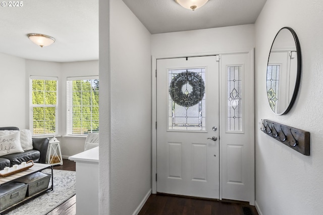 1537 W 13th Ave, Junction City, OR 97448 - entrance foyer featuring dark wood-type flooring and baseboards